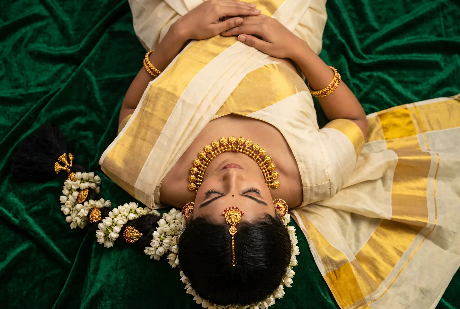 Bridal model with jasmine wearing temple necklace