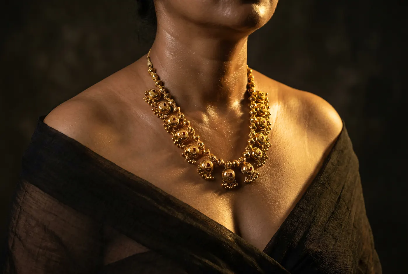 High fashion editorial portrait with temple gold necklace