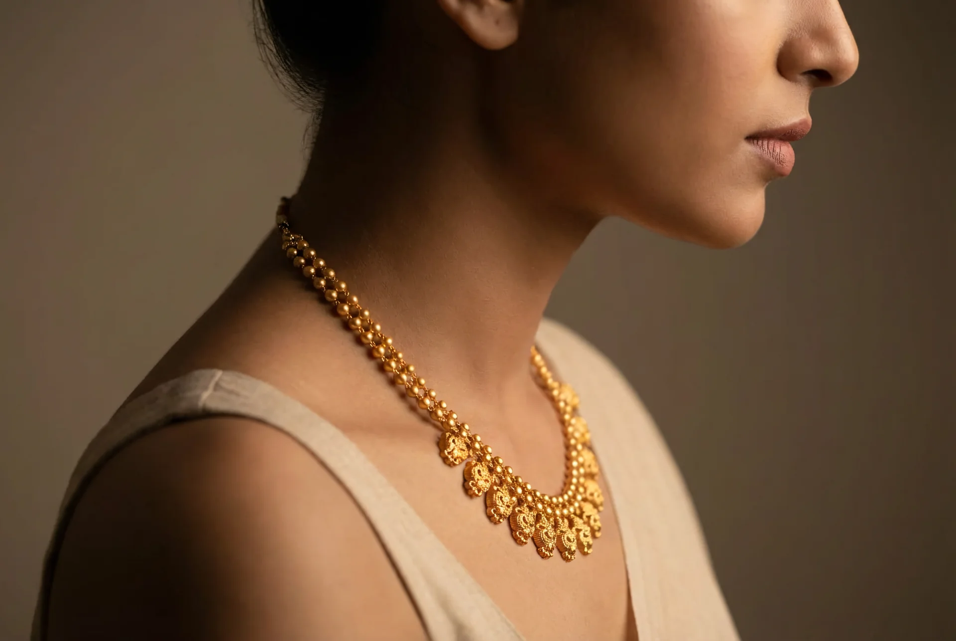 Portrait wearing Kasu Mala temple necklace
